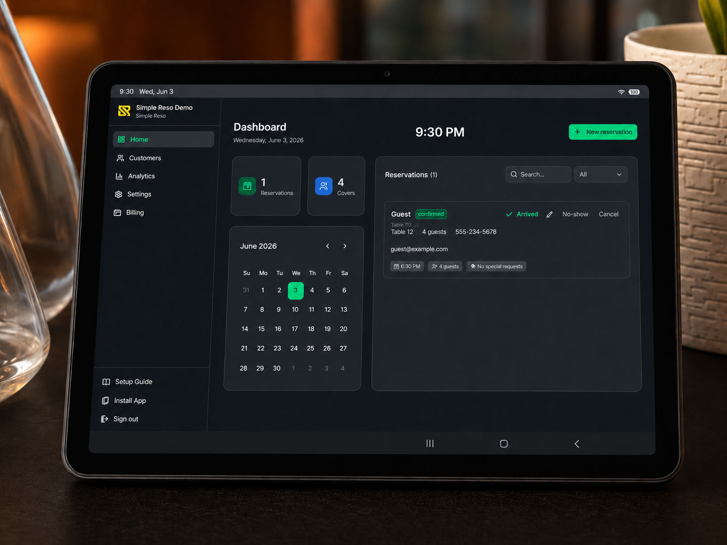 The Simple Reso dashboard running on a tablet at a restaurant host stand, showing the day's reservations, calendar, and guest details